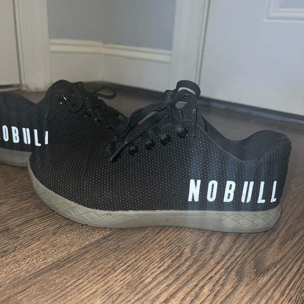 Like NEW NOBULL trainers. Kept in box. Black and olive green.
